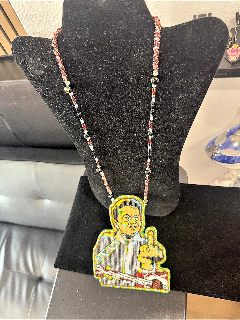 A custom, high-quality Native American beaded portrait medallion Johnny cash